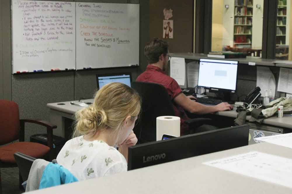 Students working at the IT Service Desk