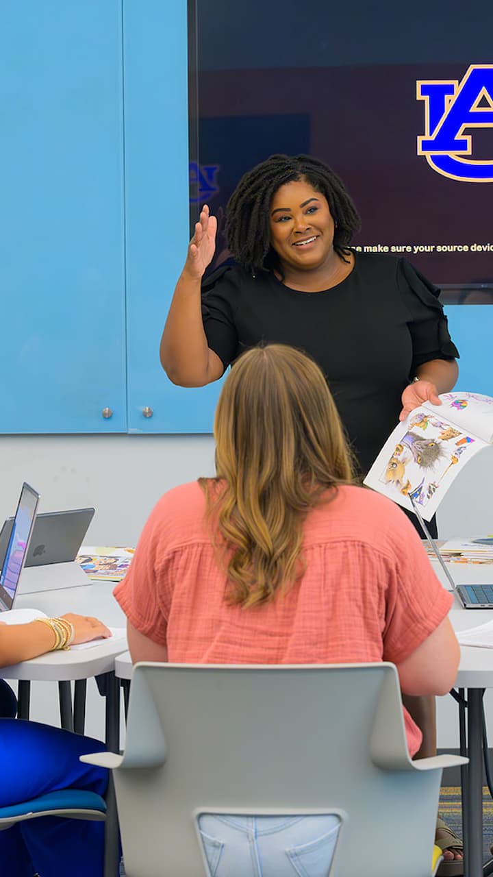 teacher standing in front of students