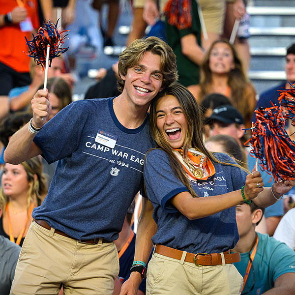 Students in sports stadium
