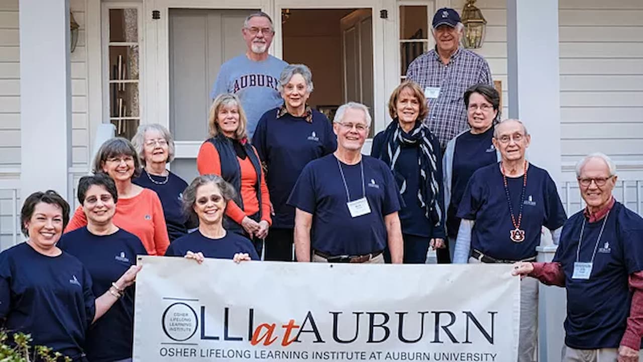 members of the group posed with an OLLI sign