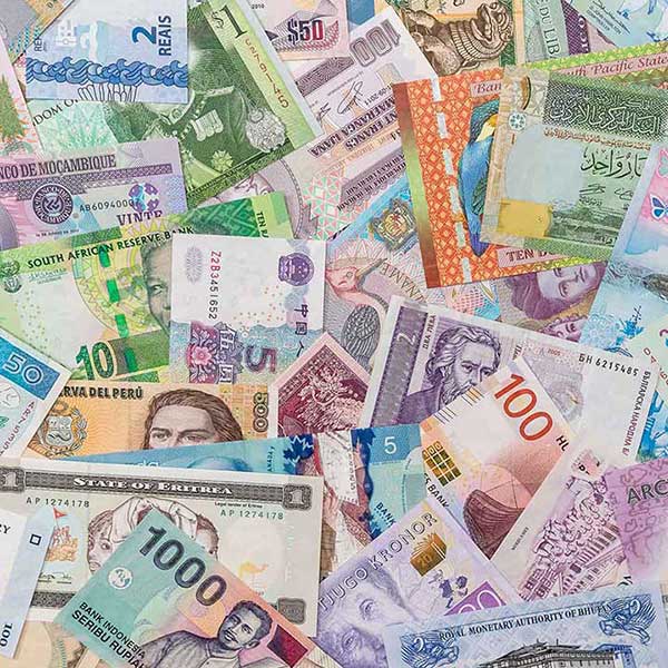 Collection of international banknotes from various countries, representing global currencies and international finance