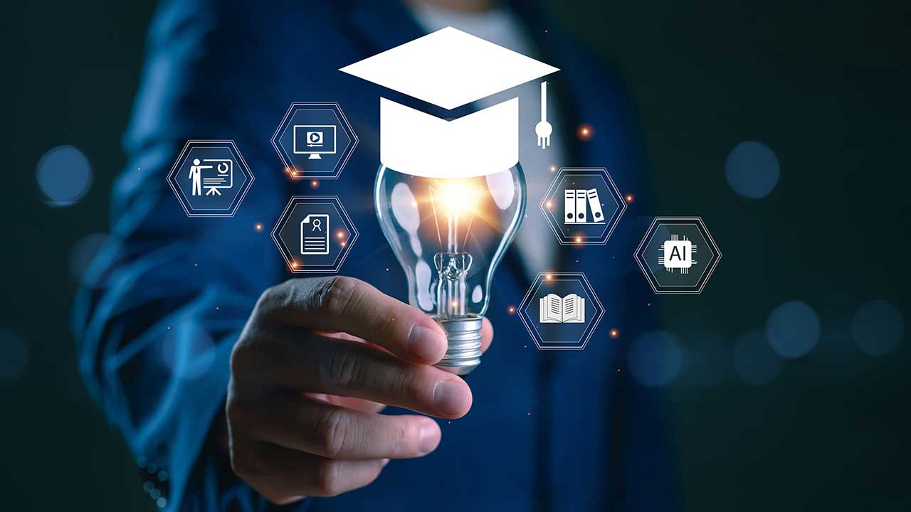 Graduation cap and illuminated lightbulb surrounded by educational technology icons, symbolizing global learning, academic resources, and innovation