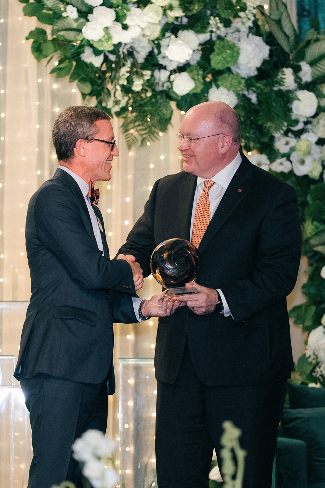 Faculty Awards 2025 Dr. Norman Godwin accepting an award from President Chris Roberts