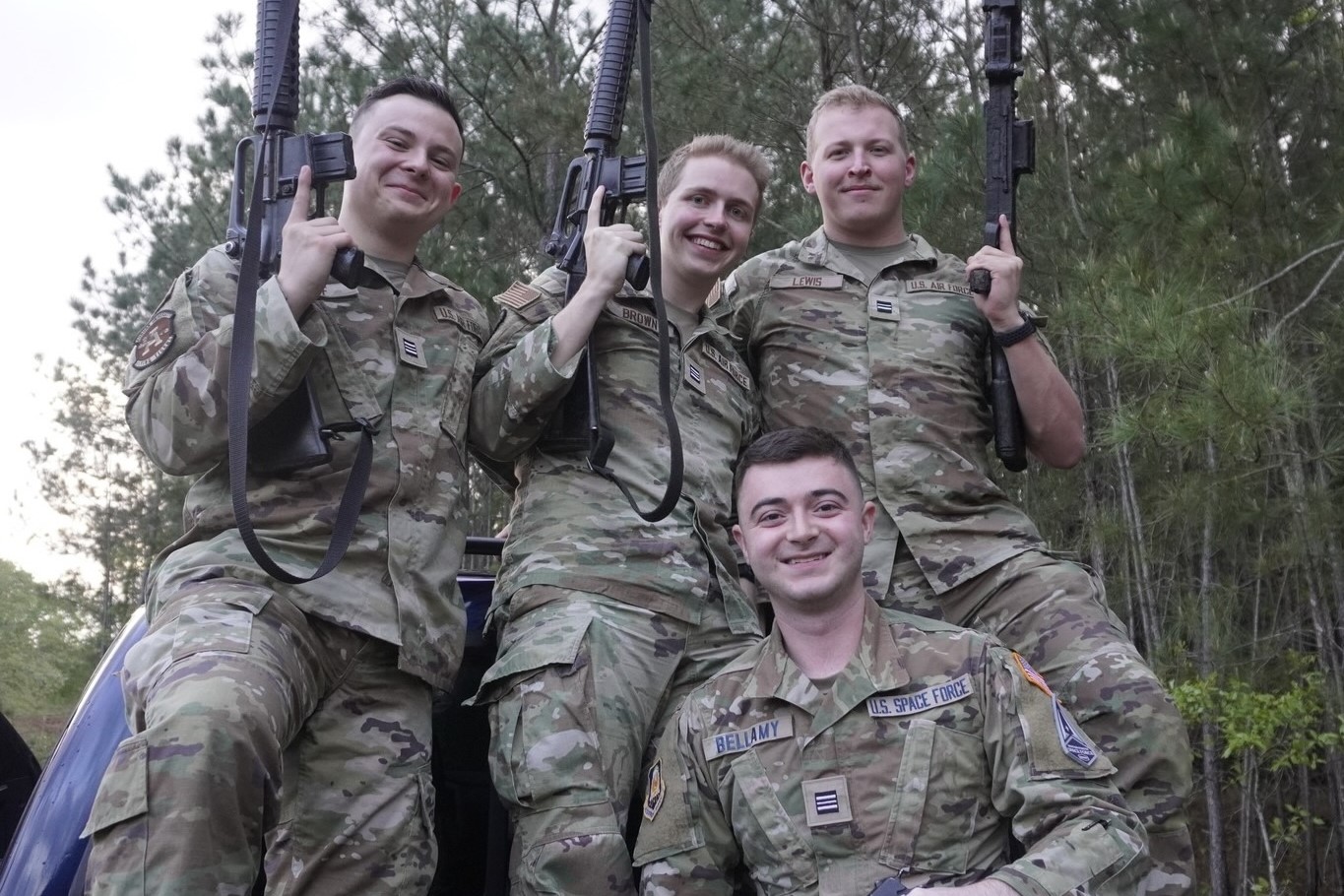 Cadets in a truckbed.