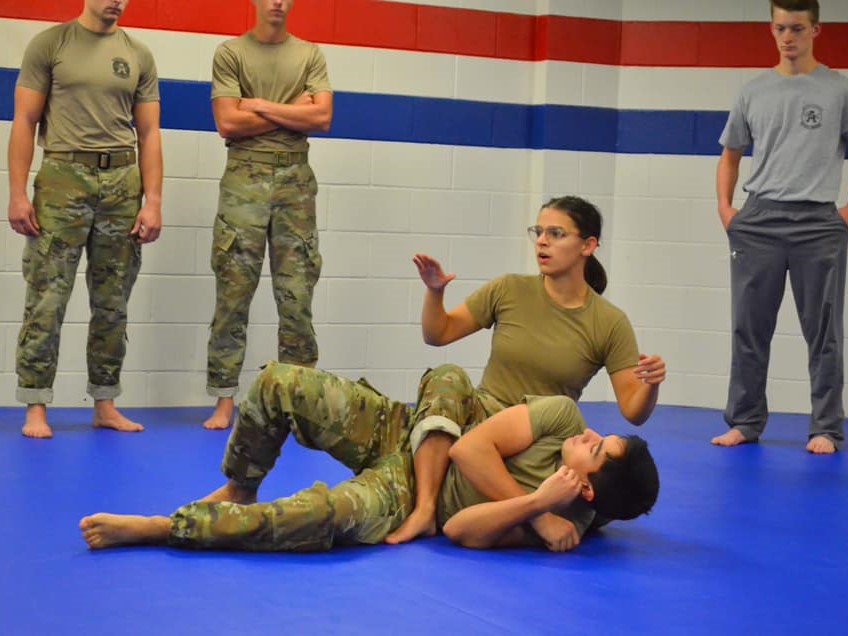 Image of cadets demonstrating combatives moves.