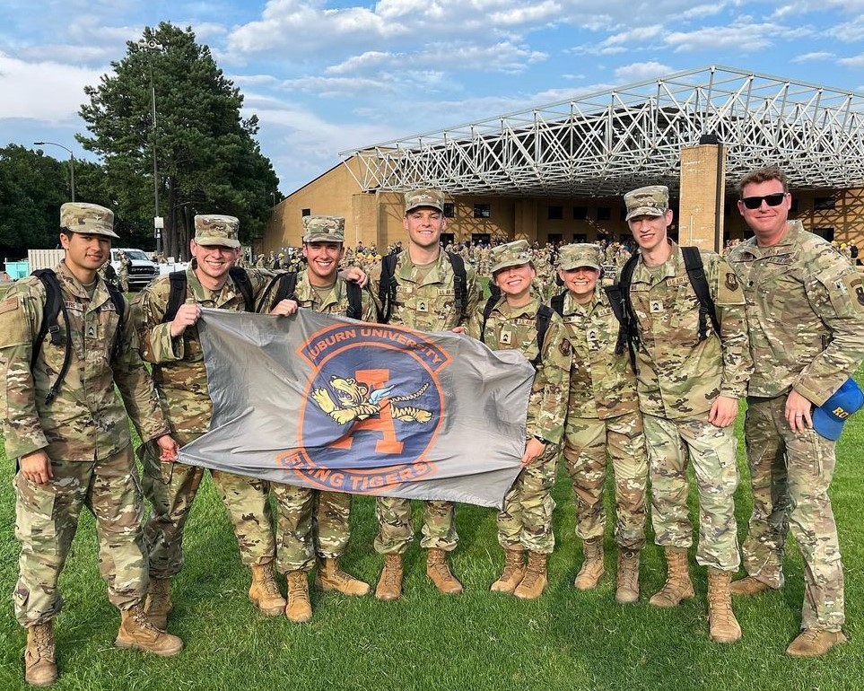 Group of cadets holding Det 005 flag