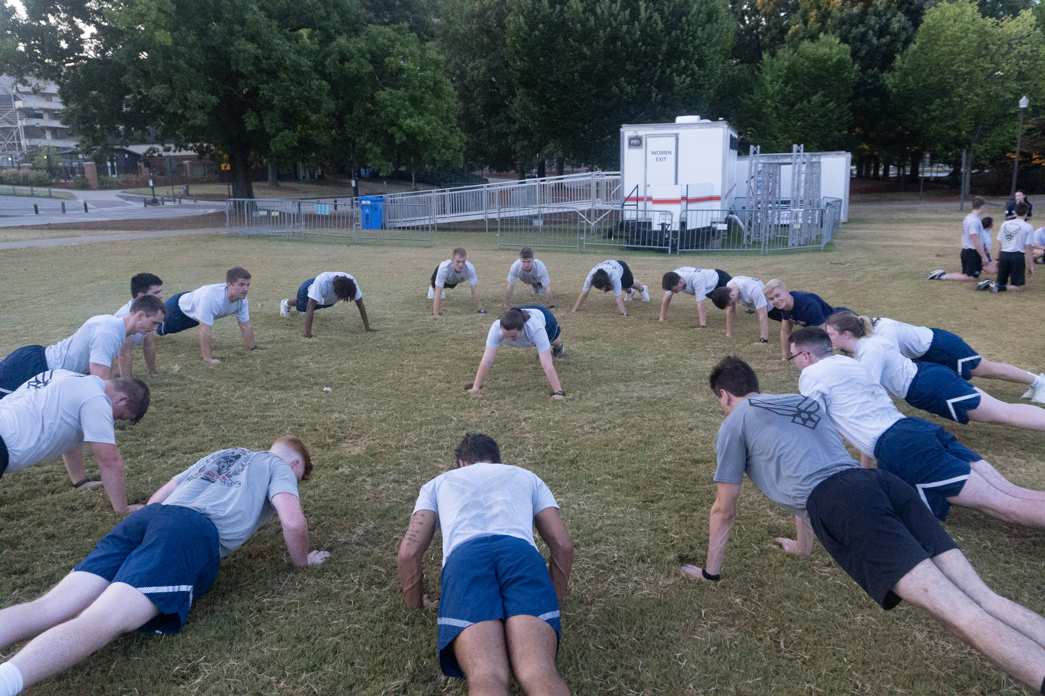 Cadets doing pushups.