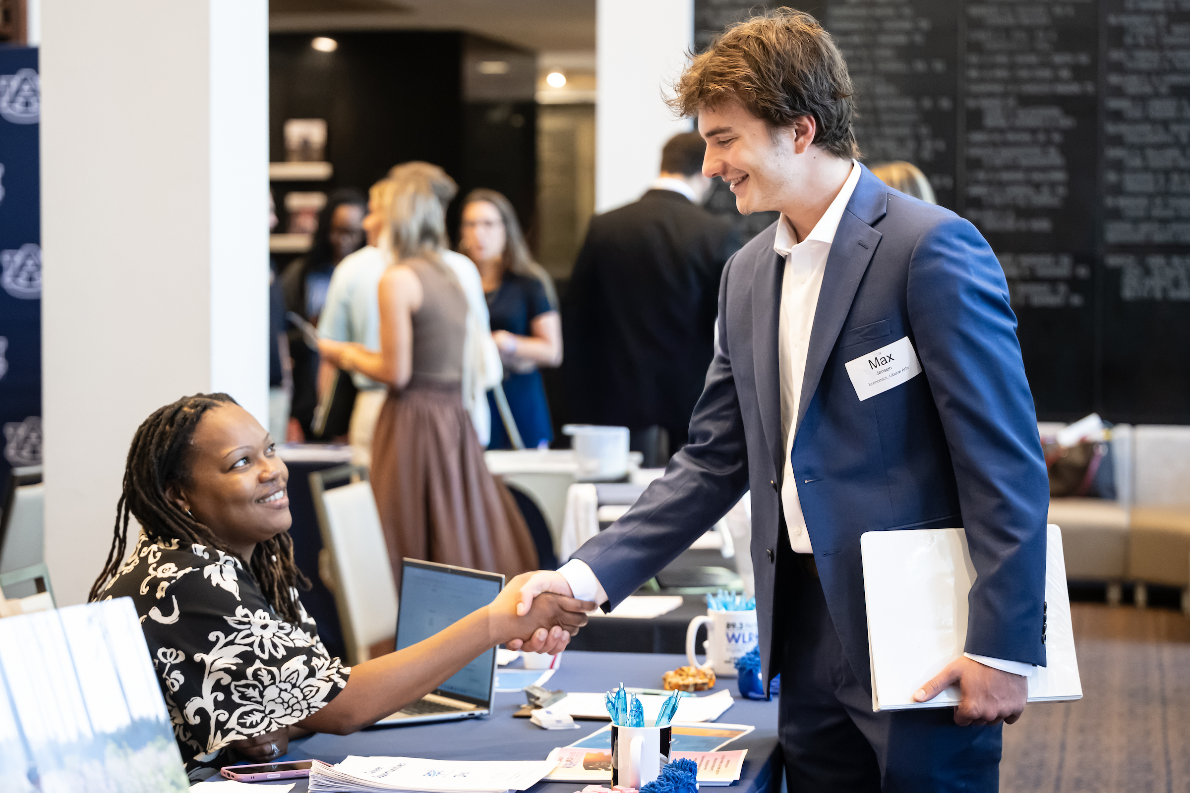 two people shaking hands