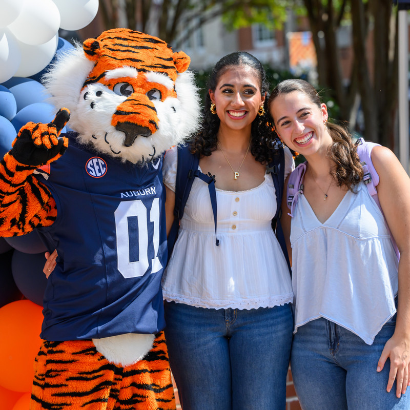 two Camp War Eagle counselors with shakers