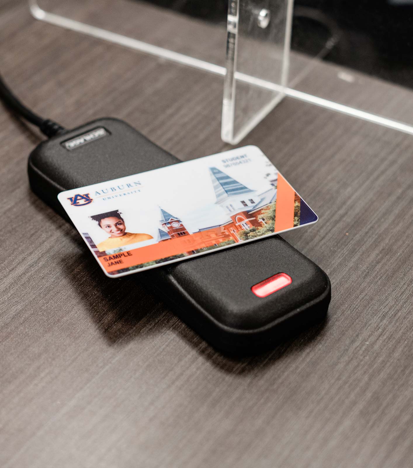 A Tiger Card sits on a card scanner
