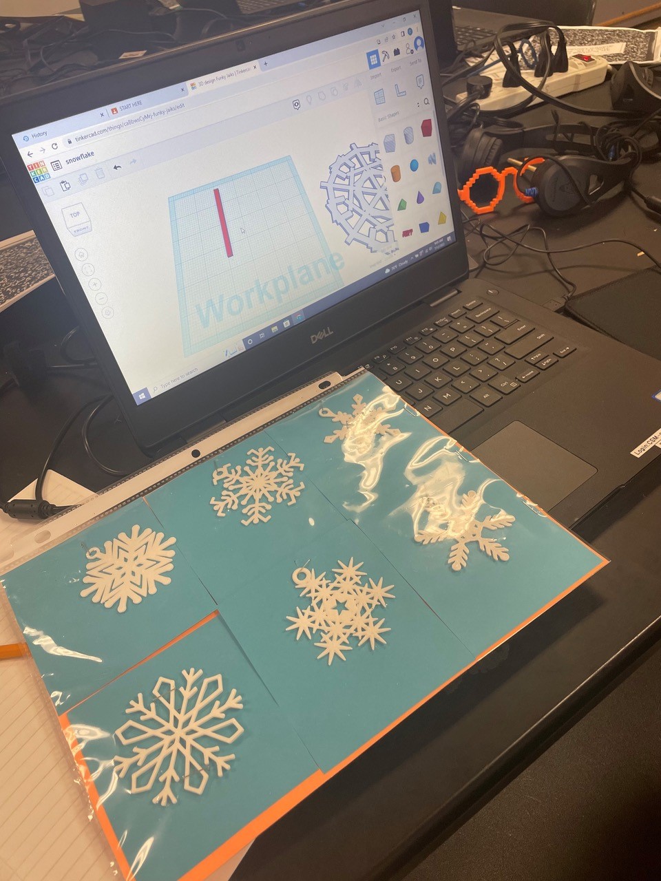 Students attending SCORE’s introductory 3D printing and design camp designed and printed snowflakes.