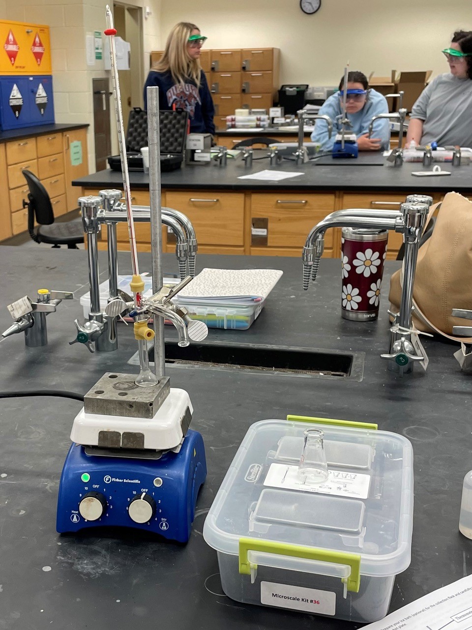 Teachers utilize a basic microscale organic glassware kit in Dewayne Riddle’s chemistry distillation lab—an example of the type of equipment that Science in Motion can provide for high school science teachers.