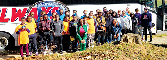 Tamarcus Millner, president of the Curtis House and YPiT Administrator; Martina McGhee, teacher of Environmental Sustainability for YPiT, and Shikia Carter, is the graduate assistant for YPiT, are pictured with participants of YPiT.