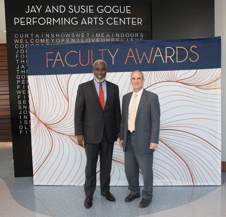Dr. Cook and Steven Brown pose for photo at Faculty Awards show