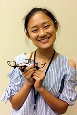 Xiao Xuan Meng, visiting from China, enjoys
participating in Drone Camp and encouraging girls to
learn about drones