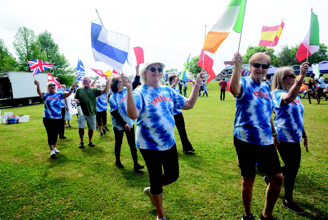 Global Community Day members with flags of Europe