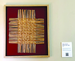 The finished river cane mat by Muscogee Creek artist Mary Smith hangs in Pebble Hill, the historic Scott-Yarbrough House.