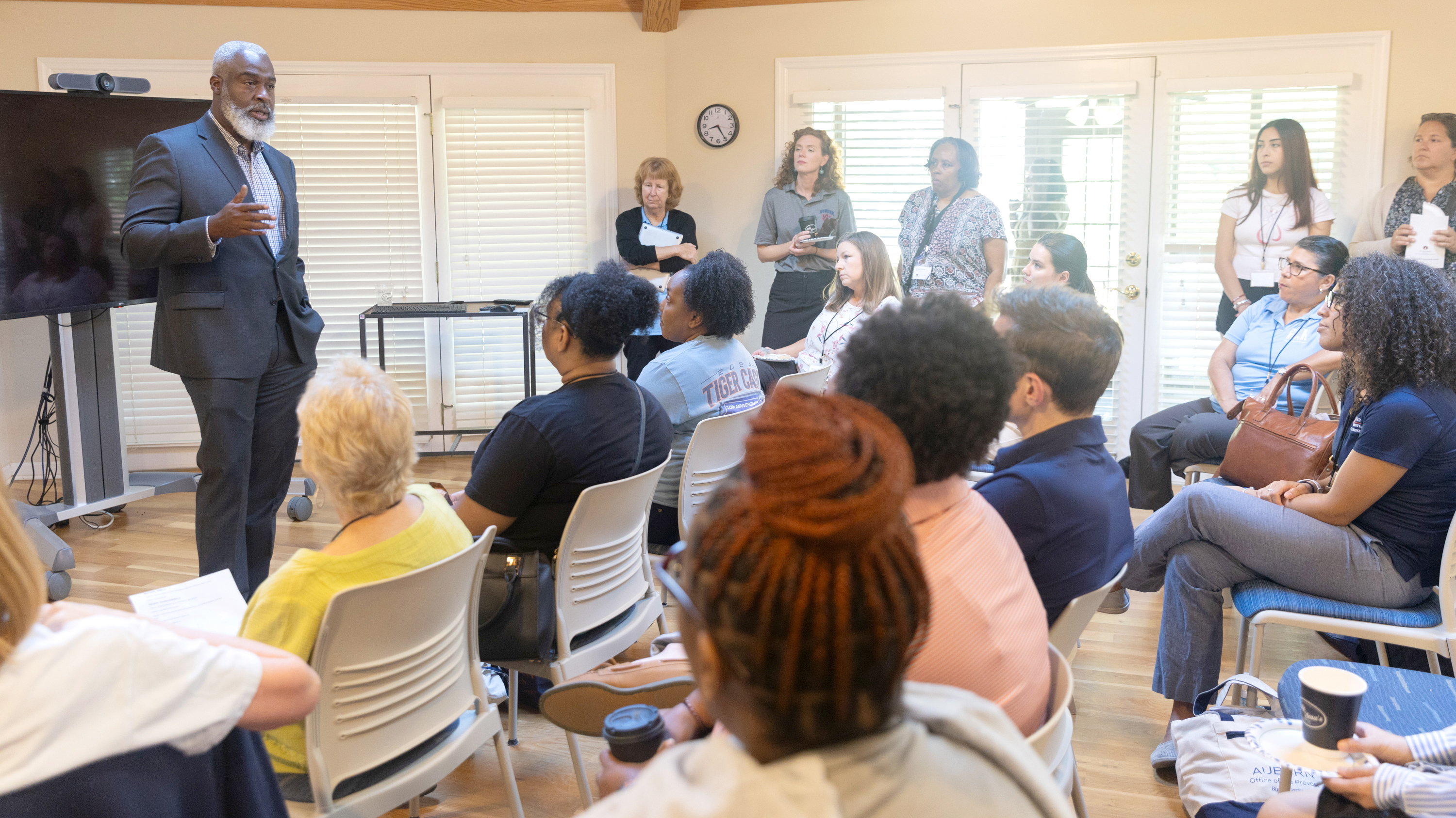 Cook addresses the Auburn Across Alabama - faculty experience cohort before they leave to visit locations in the Alabama Black Belt to explore opportunities to collaborate with community leaders to address issues of concern.