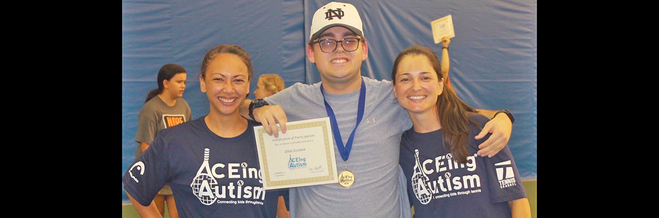 Dr. Melissa Pangelinan and Dr. Loriane Favoretto (Ph.D. from Auburn University, 2019) celebrate the end of the summer Auburn University ACEing Autism adapted tennis program with a participant!