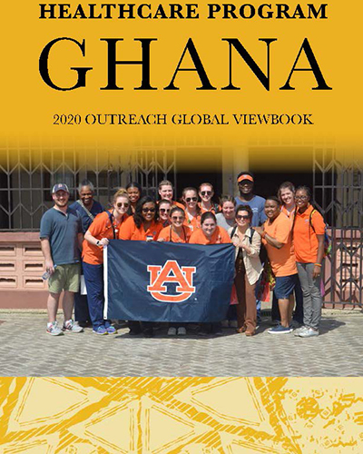 Healthcare Program Ghana, 2020 Outreach Global Viewbook, Group of students holding an Auburn University flag standing outside the healthcare clinic.