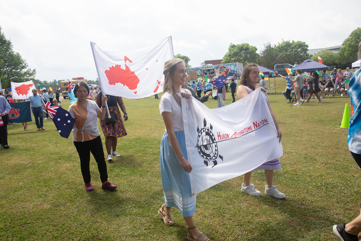 Participants in parade holding flags