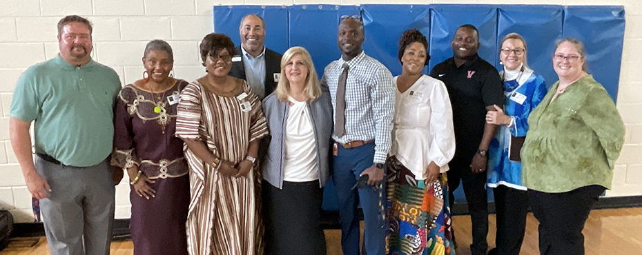 Dr. Elizabeth I. Quansah, Dr. Leslie A. Cordie, Dr. Jason Bryant, Dr. Chippewa Thomas, and Dr. Venus Hewing with staff of Valley High School.