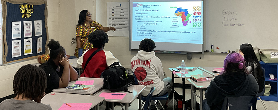 Woman teaches a class of students