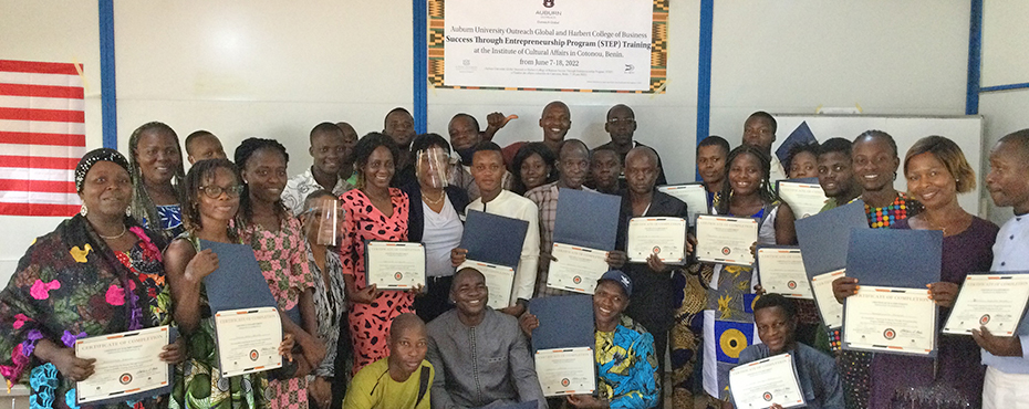 Group photo of Benin training participants with certificates