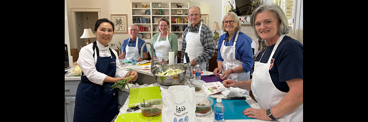 OLLI members prepare a traditional Korean meal guided by instructor Chengsoo Byun.