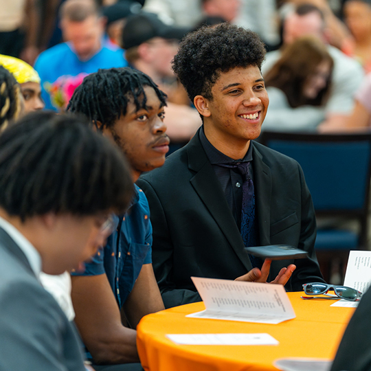 Students sitting around a table