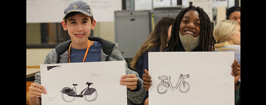 Students posed with their bike drawings