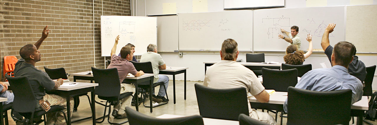 Students in a classroom during an electrical class.