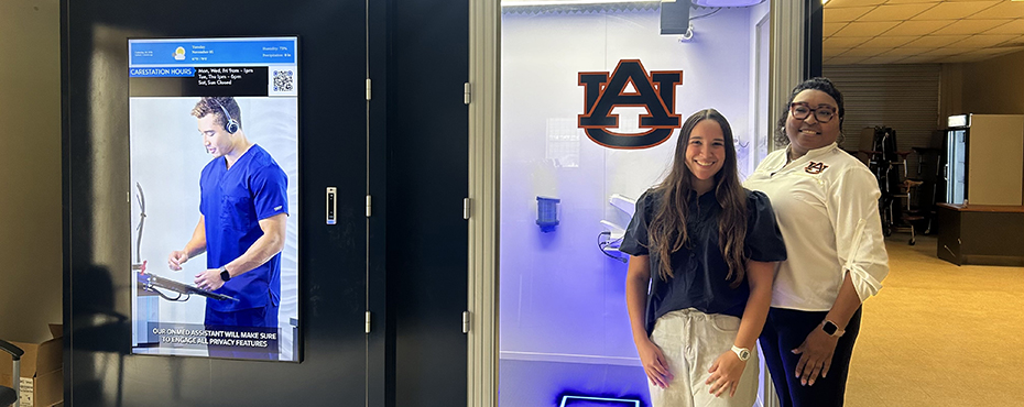 Our Wilcox County Extension Coordinator and Graduate Student Assistant standing outside the OnMed CareStation located in the Elijah Tracey Shaw III Community Center, in Wilcox County.