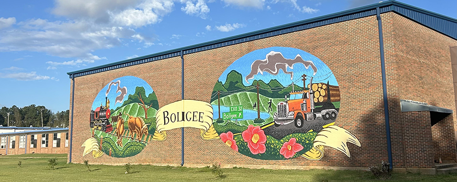 An exterior image of a Boligee mural at the Boligee Community Center where the Greene County OnMed Care Station is located. 