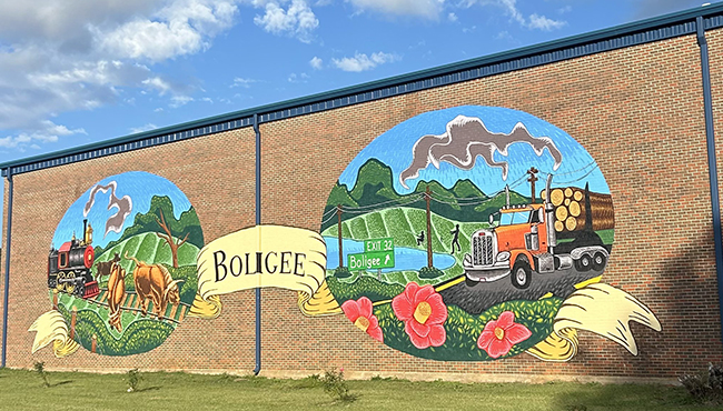 An exterior image of a Boligee mural at the Boligee Community Center where the Greene County OnMed Care Station is located. 