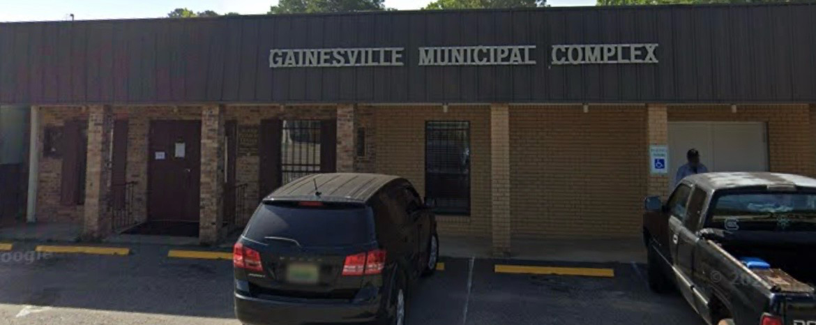 Exterior of the Gainesville Municipal Complex in Sumter County, Alabama, a modern facility with a neutral tone.