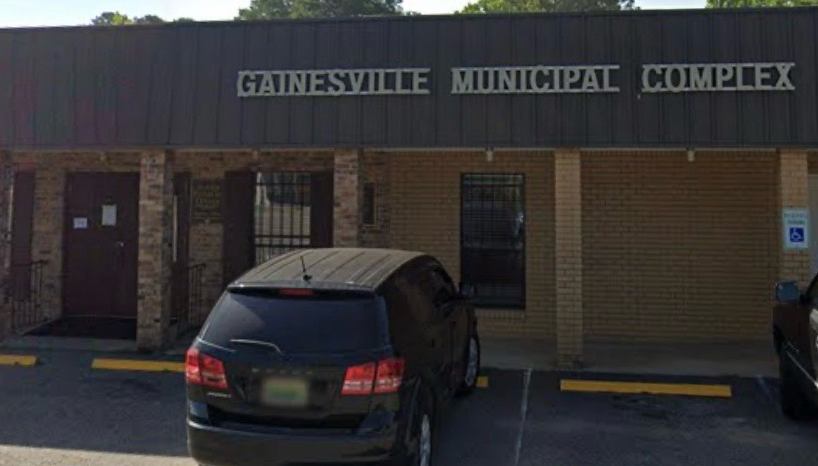 Exterior of the Gainesville Municipal Complex in Sumter County, Alabama, a modern facility with a neutral tone.