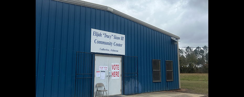 Exterior view of the Elijah Tracey Shaw III Community Center in Catherine, Wilcox County, Alabama, a light-colored building with a welcoming entrance surrounded by greenery.