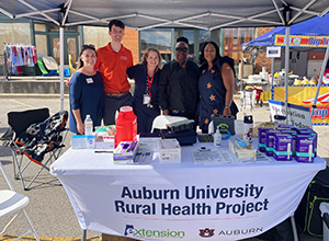 Extension Coordinator, Rachel Snoddy, accompanied by Auburn University staff and community members at a community gathering in Chambers County