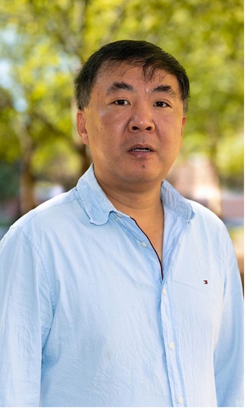 Headshot photo of Yang Zhou