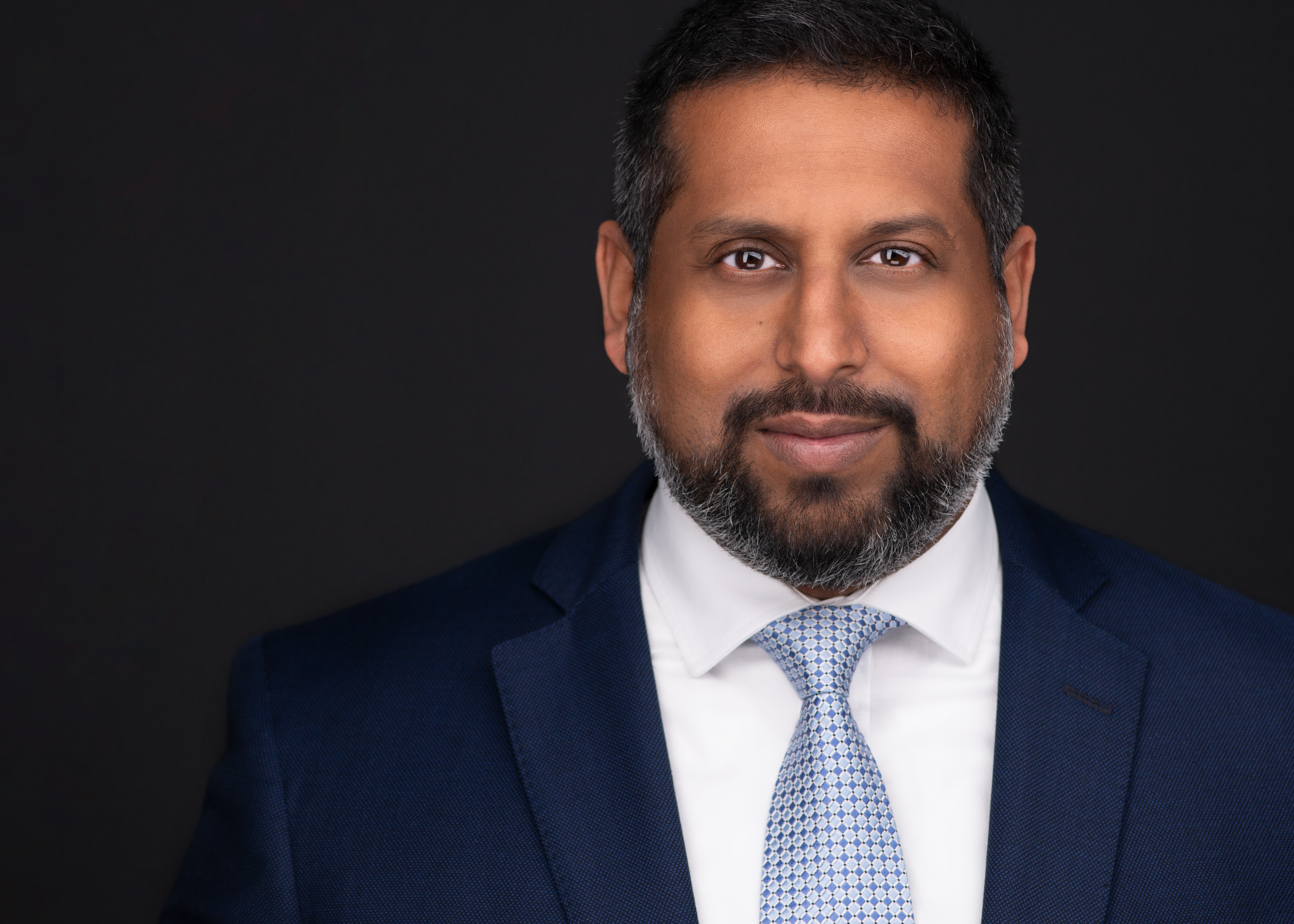 Headshot photo of Vilas Dhar