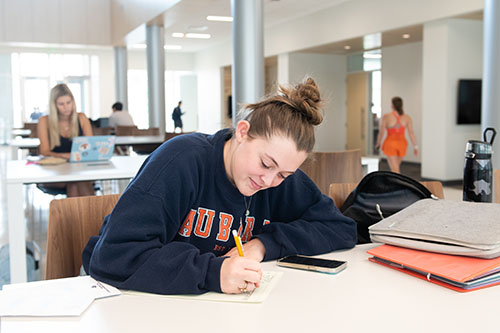 Student studying in ACLC building